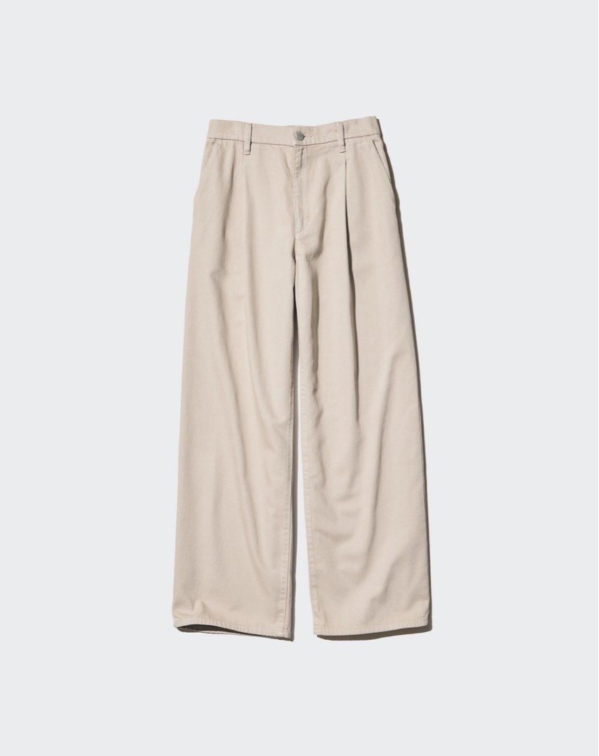 Uniqlo Drapey Denim Pleated Pants (Category: Other Bottoms) located in Pasig City. Submitted by closetmaxxing (Listing ID 1415261146, Image 1). Description: Uniqlo Drapey Denim Pleated Pants Used once, good as new Beige, Small Bought for ₱1,990.