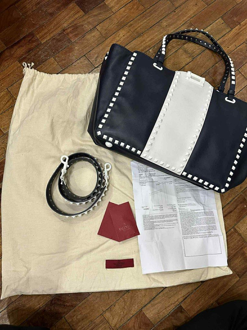 Valentino Garavani Rockstud Double Handle Tote (Category: Luxury Bags & Wallets) located in Quezon City. Submitted by prelovedbyvandf (Listing ID 1415293676, Image 1). Description: Valentino Garavani Rockstud Double Handle Tote Guaranteed Authentic Condition: 10/10 Still negotiable RFS: Decluttering .
