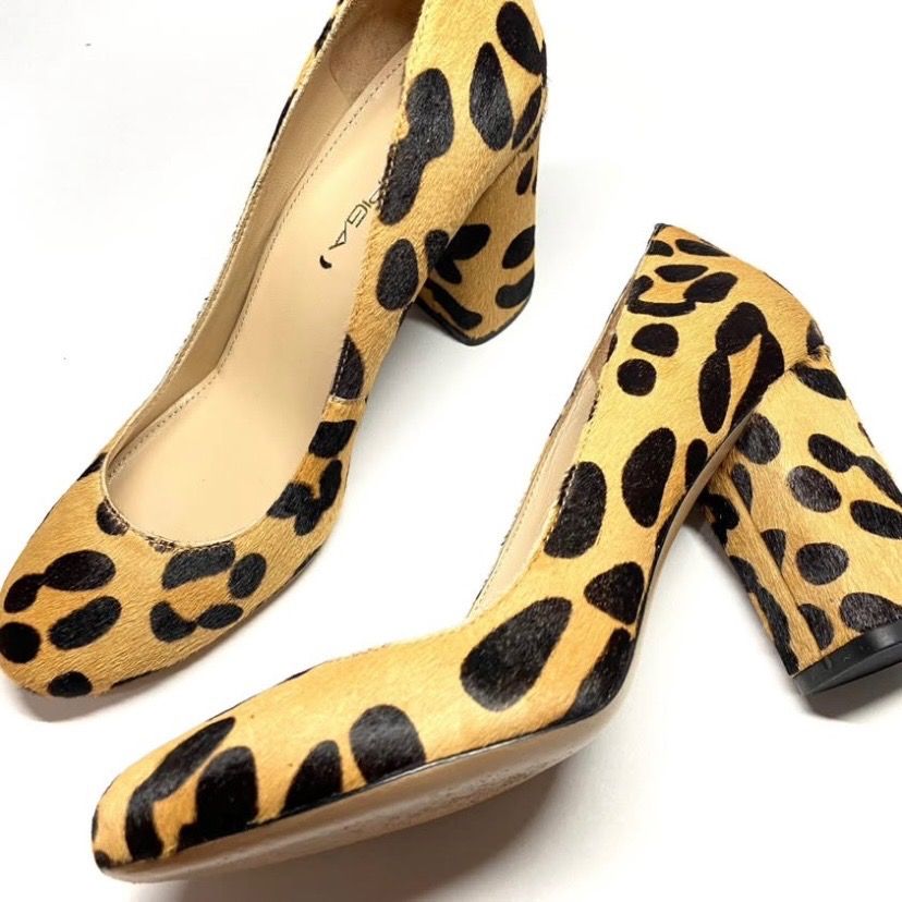 Via Spiga Leopard Print Heels Pumps (Category: Heels) located in Las Pinas. Submitted by rewearstudios (Listing ID 1415419026, Image 2). Description: Designer brand. 10/10 condition, used twice only. No flaws! These stunning Via Spiga pumps feature a striking leopard print haircalf design with a comfortable block heel and sleek round toe. Beautifully crafted and perfect for elevating any outfit, from workwear to a night out. Stylish, sophisticate
