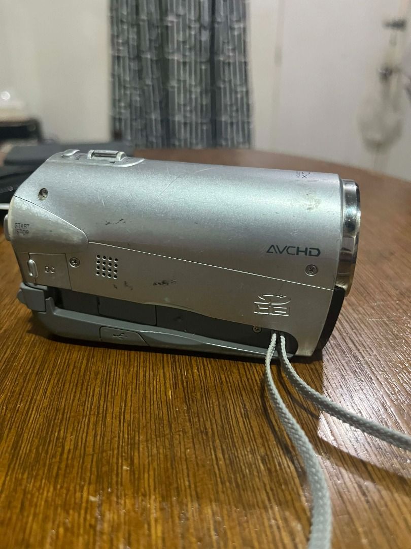 Victor GZ HM110 (Working with issue) (Category: Video Cameras) located in Bacolor. Submitted by emman_dilu (Listing ID 1415368148, Image 3). Description: RFS: Need funds for camera IF YOU CAN SEE THIS IT'S STILL AVAILABLE Cosmetics: 5/10 Features: - Dual SD Card slot - Flashlight - 20x Optical zoom lens - Photo button (Digicam mode) Issues: - LCD Screen not working - Flashlight won't turn off - Broken handstrap DM for sample footage and details N