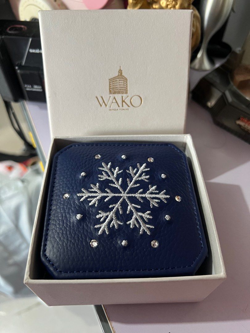 Wako Jewelry Box with Snowflake Design (Category: Accessory Holder, Box & Organizers) located in Bacoor. Submitted by faith.hope.love28 (Listing ID 1415295893, Image 1). Description: - Elegant navy blue Wako jewelry box - Features a stunning snowflake design with embedded crystals - Interior lined with soft, light-colored fabric - Includes compartments for rings and other jewelry - Comes with the original box - Perfect for gifting or personal use