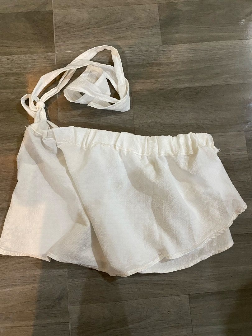 White asymmetrical one side ribbon top (Category: Sleeveless) located in Quezon City. Submitted by wompybat (Listing ID 1415357180, Image 1). Description: White asymmetrical one side ribbon top - Sheer lightweight crepe fabric - Good as new - Size: XS-S Meet-up Location: Quezon City.