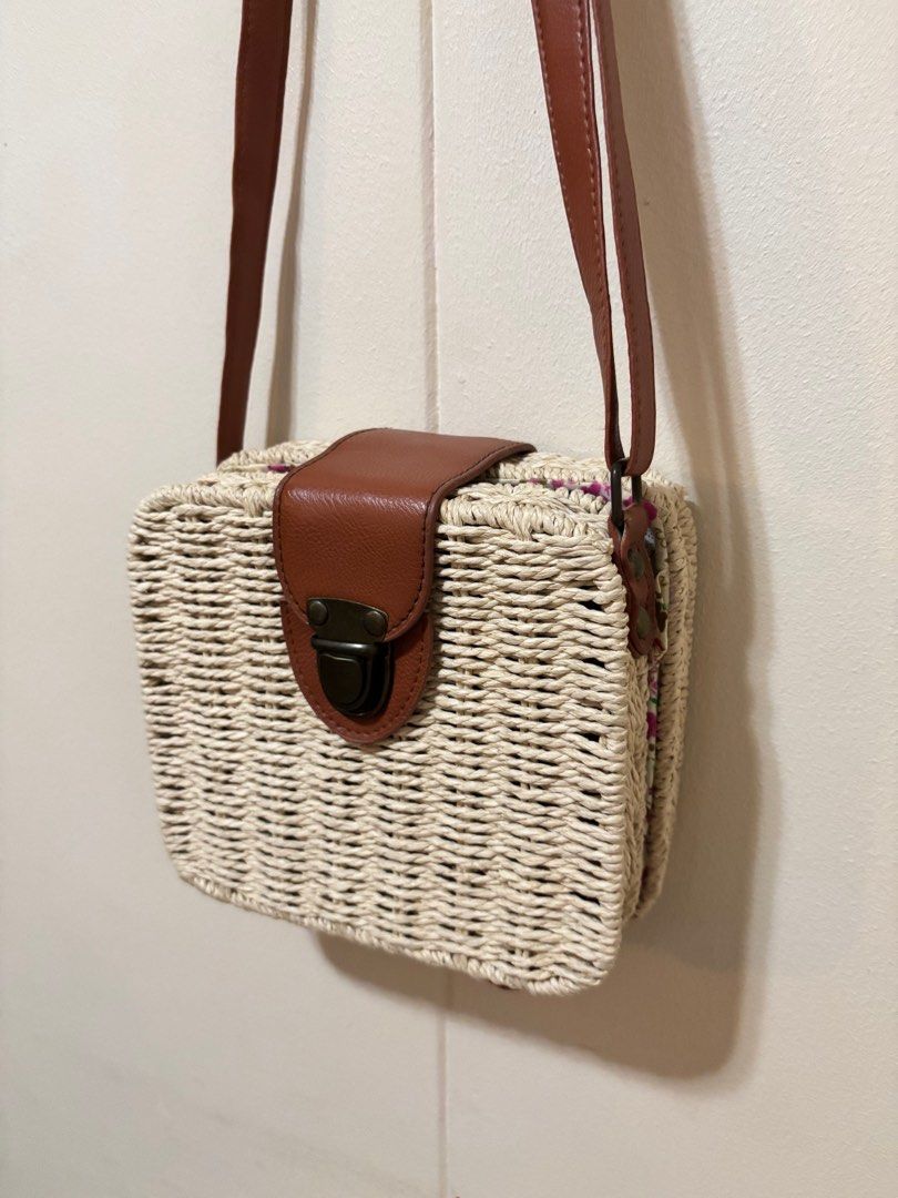 Woven Crossbody Bag with Brown Strap (Category: Cross-body Bags) located in Las Pinas. Submitted by tidyspaces (Listing ID 1415293071, Image 2). Description: Good for the beach Rattan type bag Never used.