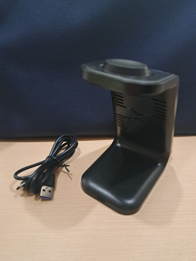 3-in-1 Magnetic Charger (Category: Chargers) located in Manila. Submitted by jmlim159 (Listing ID 1415526620, Image 2). Description: 3-in-1 ToKer New Magnetic Charger 1. Magsafe Charger (for Samsung, Apple, or other Magsafe phones) 2. SAMSUNG watch charger (♦️NOT FOR APPLE WATCH♦️) 3. Wireless charging for earphones Color: Black ✅️Included in box is USB to USB-C cable. No adapter included ✅️Used only 1x for Magsafe charger ✅️RFS: bought by mistak
