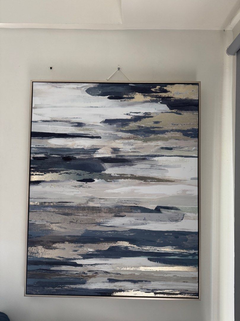 Abstract Painting with Silver Frame (Category: Frames & Pictures) located in Paranaque City. Submitted by trishapua17 (Listing ID 1415472925, Image 1). Description: - Modern abstract painting - Silver frame - Calming blue, gray, and gold tones - Ready to hang - Ideal for living room or bedroom - Square shape.