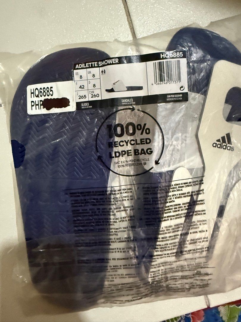 Adidas Adilette Shower Slides - Navy Blue (Category: Slippers & Slides) located in Quezon City. Submitted by anj_chan (Listing ID 1415512941, Image 2). Description: - Adidas Adilette Shower slides - Color: Navy Blue - Size: UK 8 / US 8 - Model: HQ6885 - Brand new, with original packaging - Ideal for casual wear and post-workout - Made with recycled LDPE bag.
