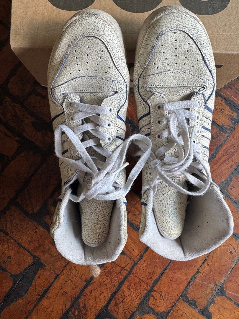 Adidas Rivalry White Blue (Porcelain design) (Category: Sneakers) located in Manila. Submitted by classy.home (Listing ID 1415474831, Image 2). Description: 2. Adidas Rivalry White Blue (Porcelain design) Condition: Slightly used (7.8/10) Size: US 9.5 Sale Price: 2200 *** Please note that is its the design of Porcelain effect and not tear down leather.
