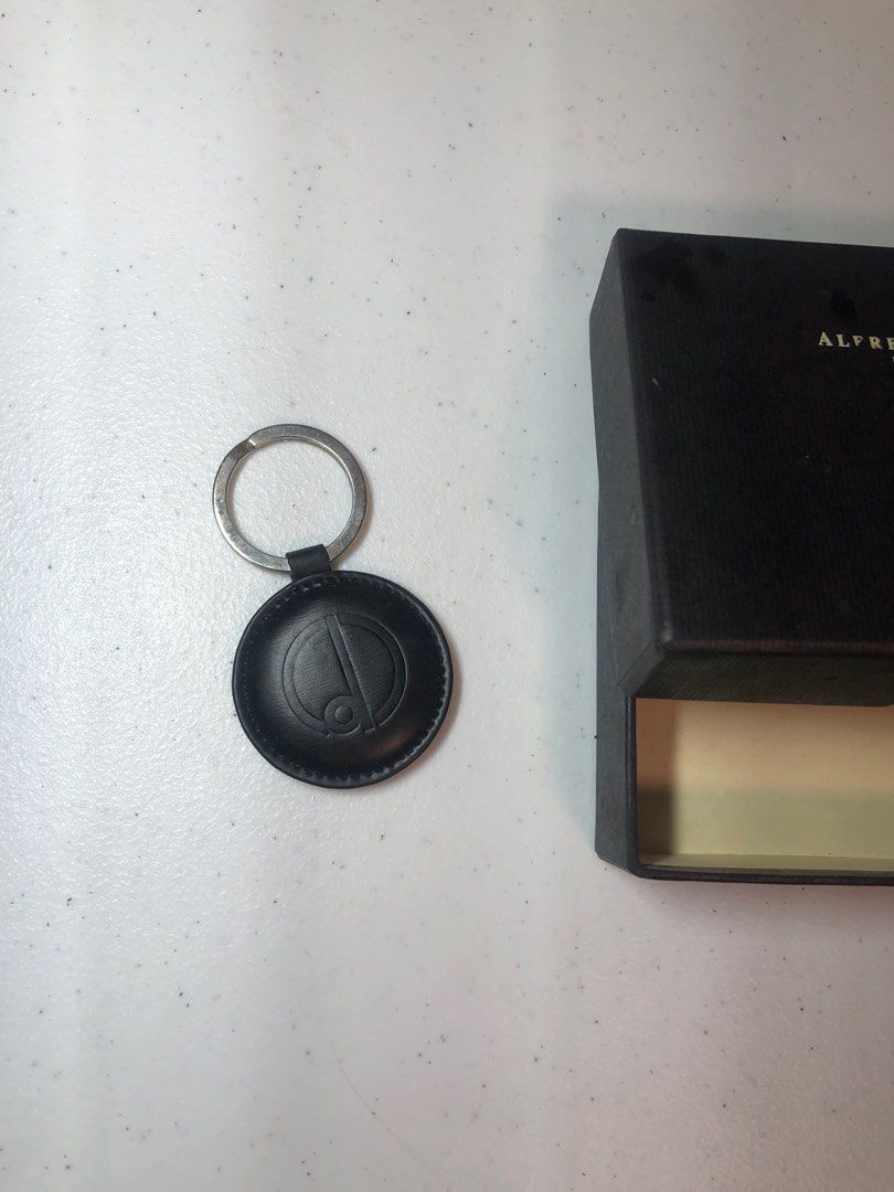 Alfred Dunhill Leather Keyring with Box (Category: Luxury Accessories) located in Manila. Submitted by all.dressed.up (Listing ID 1415447315, Image 2). Description: Genuine Alfred Dunhill keyring Brand new with box Made from black cowhide Features the Dunhill logo Comes with original black box Box has the Alfred Dunhill London logo Made in France 1,750.