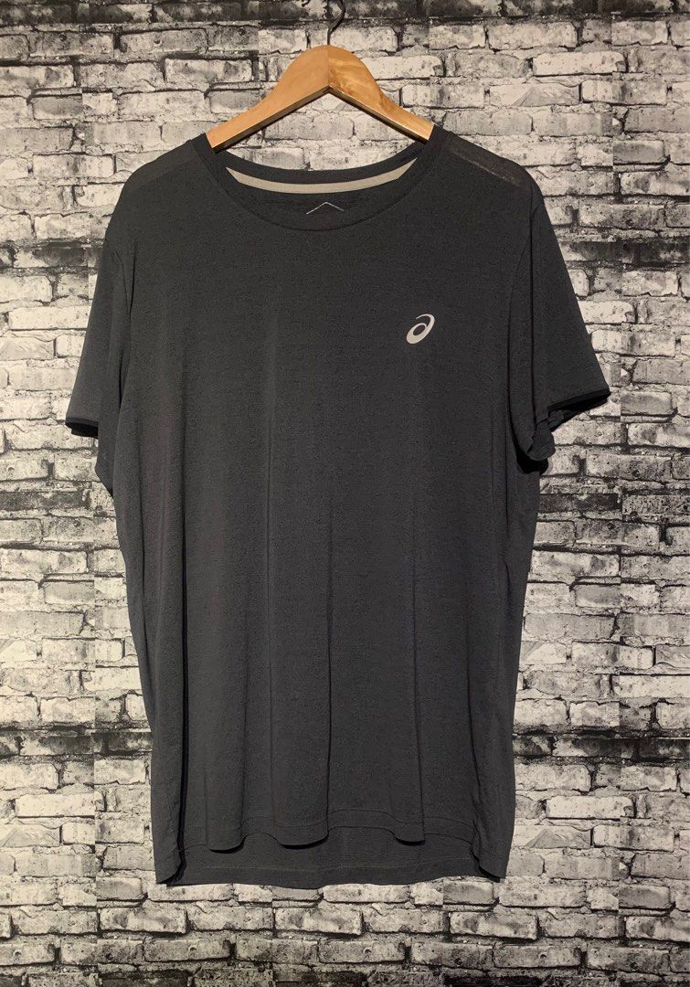 Asics Running Tee (Category: Activewear) located in Manila. Submitted by marksaban81396 (Listing ID 1415483721, Image 1). Description: Size XL Width 23.5 Length 31.5 Color rate 9./10 No issue Excellent condition .