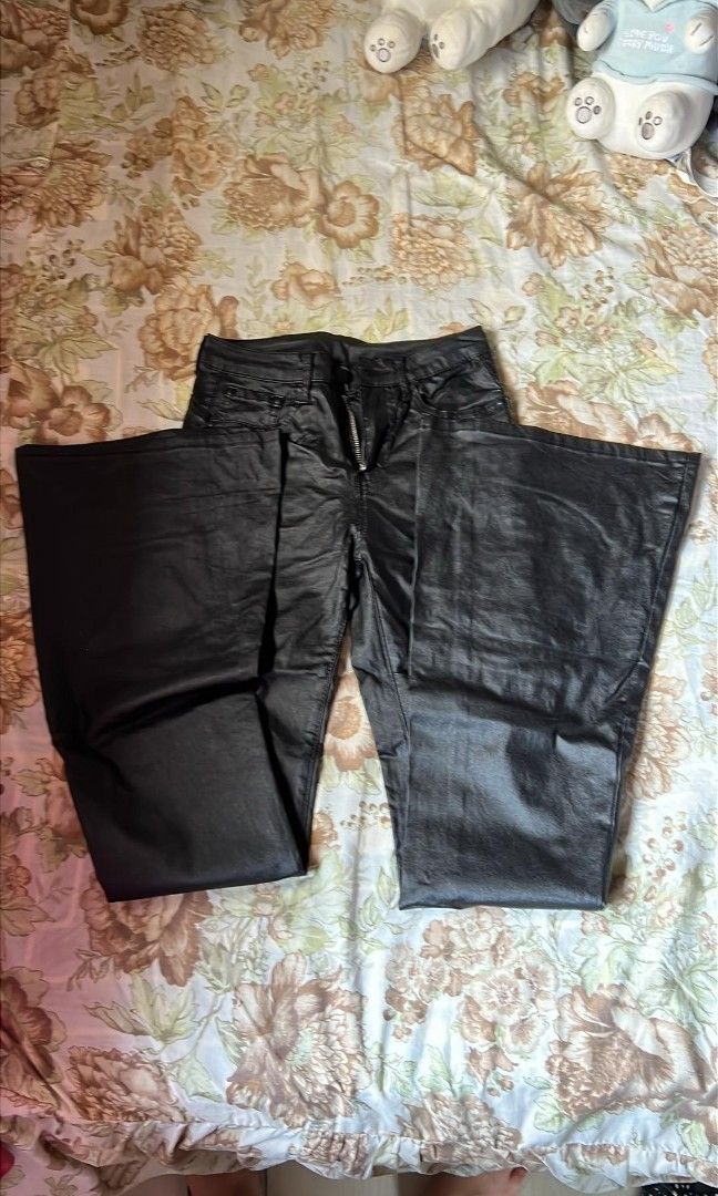 Black leather flare pants from SHEIN (Category: Jeans) located in Manila. Submitted by nicoleanne84656 (Listing ID 1415463309, Image 2). Description: My waistline is 27 but sometimes it falls from me. Just wear a belt to be sure. It's too long for me, and my height is 4'11. 5'2 women and above should wear this..