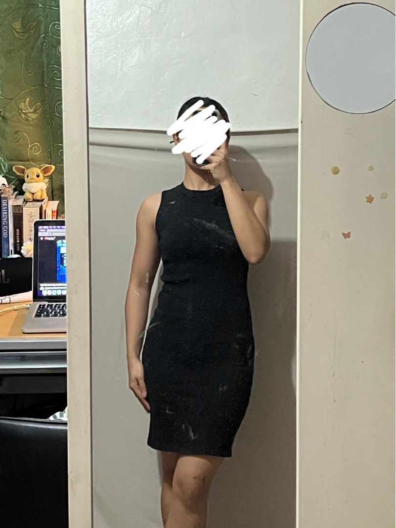 Black Sleeveless Bodycon Dress (Category: Dresses) located in Antipolo. Submitted by chi._.declutters (Listing ID 1415549757, Image 2). Description: RFS: not my style anymore never used - Black sleeveless bodycon dress - Round neckline - Fitted silhouette - Mid-thigh length - Perfect for a night out or casual wear.