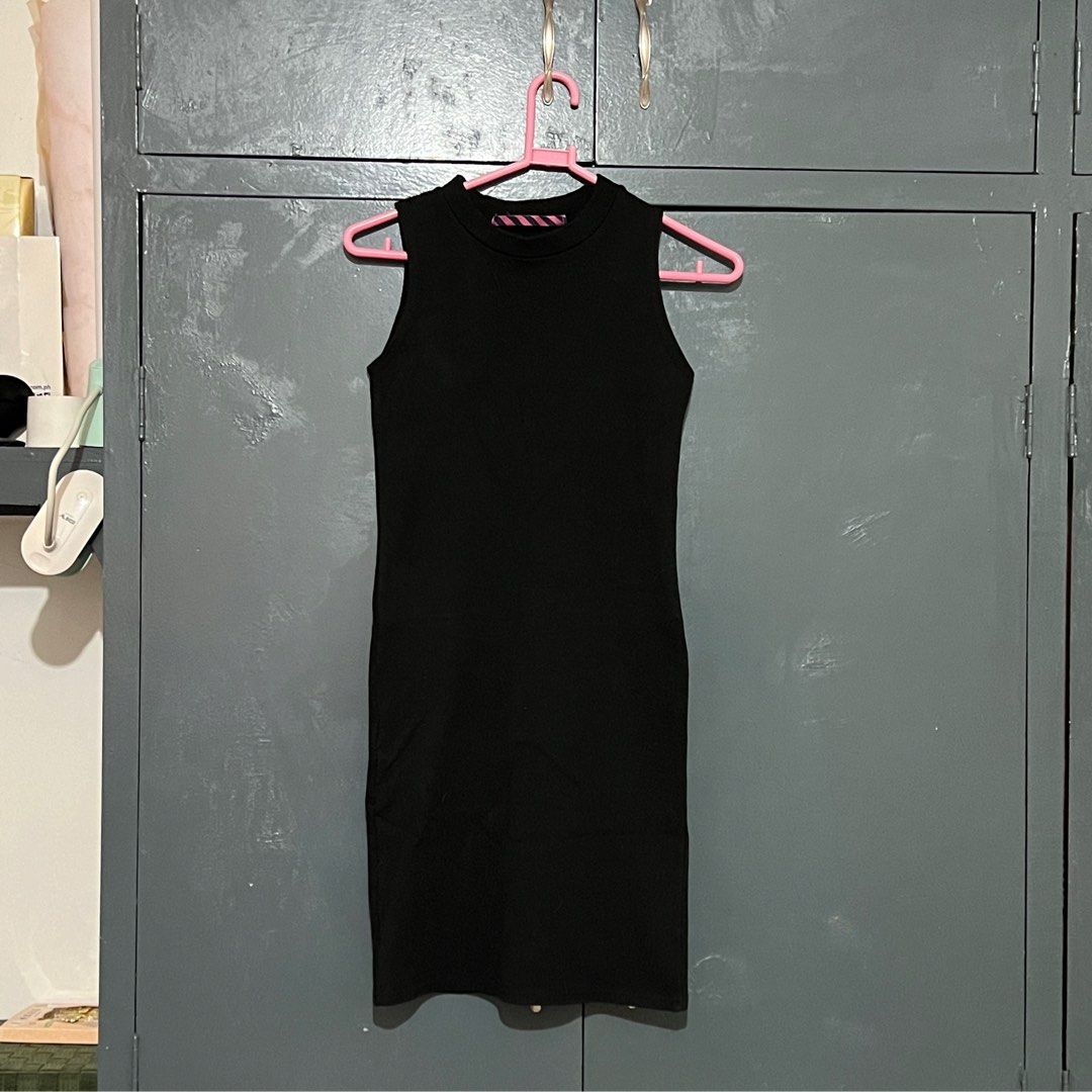Black Sleeveless Bodycon Dress (Category: Dresses) located in Antipolo. Submitted by chi._.declutters (Listing ID 1415549757, Image 3). Description: RFS: not my style anymore never used - Black sleeveless bodycon dress - Round neckline - Fitted silhouette - Mid-thigh length - Perfect for a night out or casual wear.