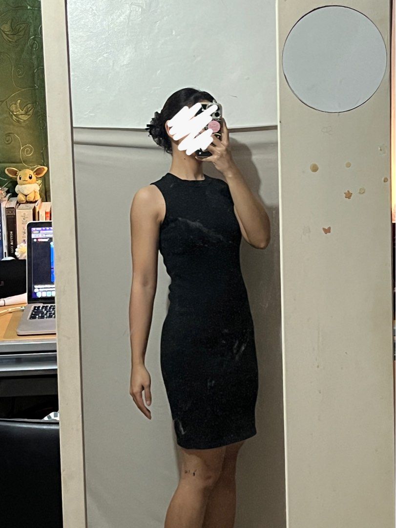 Black Sleeveless Bodycon Dress (Category: Dresses) located in Antipolo. Submitted by chi._.declutters (Listing ID 1415549757, Image 1). Description: RFS: not my style anymore never used - Black sleeveless bodycon dress - Round neckline - Fitted silhouette - Mid-thigh length - Perfect for a night out or casual wear.