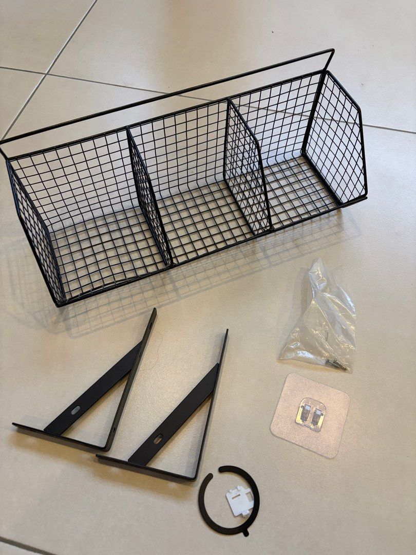 Black Wire Mesh Storage Baskets (Category: Storage Boxes & Baskets) located in Cebu City. Submitted by happyheartcebu (Listing ID 1415526549, Image 1). Description: - Includes two black wire mesh storage items. - One rectangular basket with: - Three compartments - Handle - One three-tier corner shelf. - Perfect for organizing your home or office..