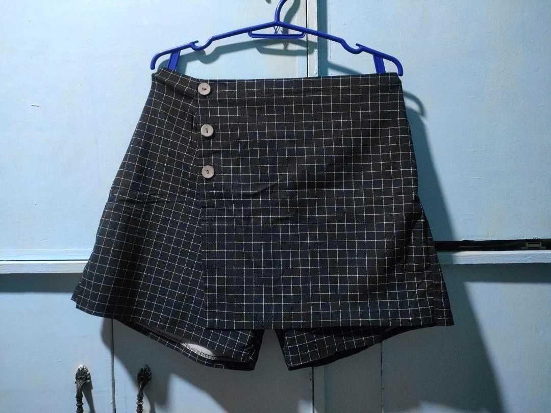 brand new plus size navy blue windowpane check skort (Category: Other Bottoms) located in Silang. Submitted by oddsense (Listing ID 1415536935, Image 1). Description: Brand: unknown Waist: starts from 30 in (76 cm) Length: 41 cm Color: Navy Blue/Bluish Black (may vary due to lighting) Pattern: Windowpane Check Material: possibly spanribs Weave: Twill Opacity: Regular Elasticity: Mid-stretch Fit: Regular fit to Loose fit Flaws: none Additional Det