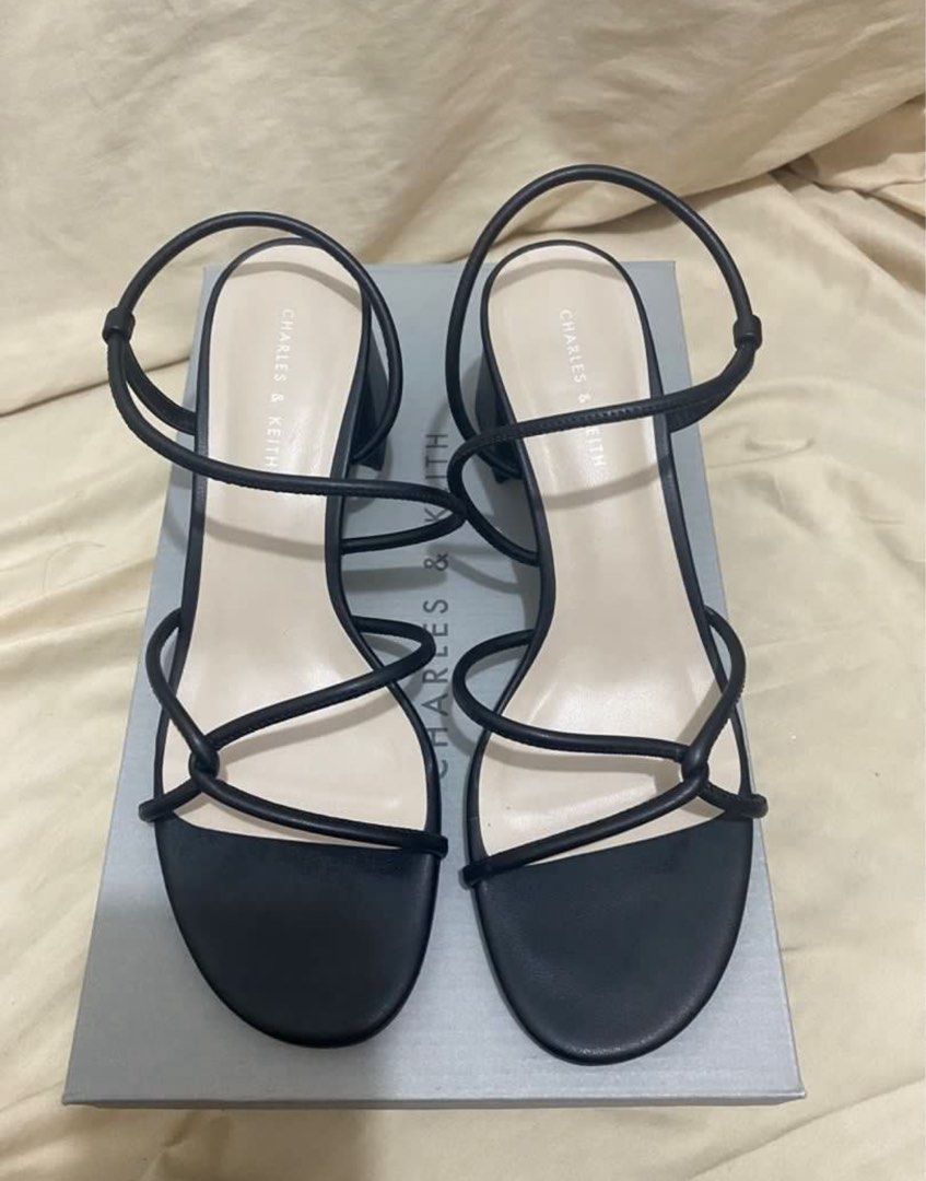 Charles & Keith Meadow Block Strappy Sandals (Category: Sandals) located in Rizal. Submitted by okcath (Listing ID 1415483351, Image 3). Description: - Charles & Keith black strappy sandals - Size 37 - Block heel design - Delicate straps - Comes with original box - Ready to wear.
