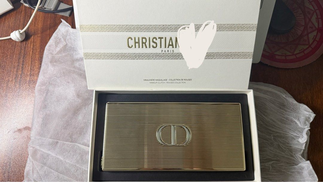 Christian Dior Clutch Bag (Category: Luxury Bags & Wallets) located in Lapu Lapu. Submitted by wtvrandi (Listing ID 1415604449, Image 2). Description: Christian Dior Holiday clutch bag Bought in Rotterdam 🇳🇱 Bag, sling chain, and box only Lipsticks not included Price negotiable Meet up or shipping.