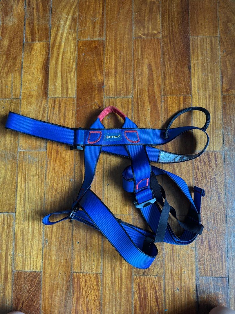 Xinda Climbing Harness (Category: Sports & Fitness Nutrition) located in Pasig City. Submitted by paulinestarfish (Listing ID 1415476892, Image 1). Description: - Adjustable straps - Red loop at the top.