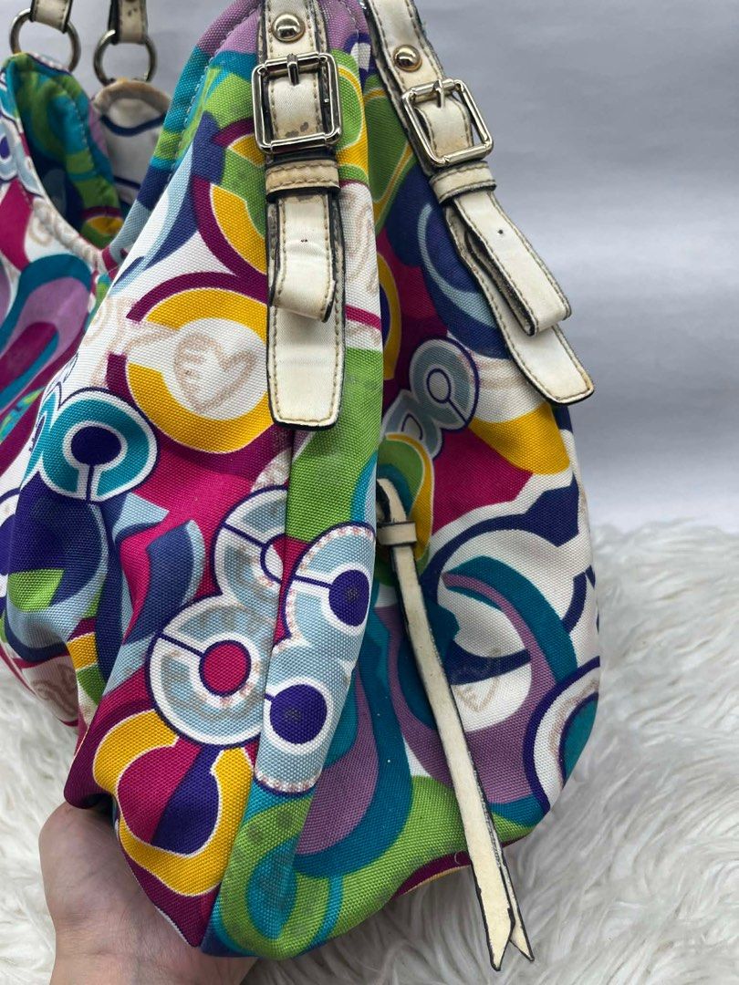 Coach Multicolor Shoulder Bag (Category: Luxury Bags & Wallets) located in Cainta. Submitted by cherie0831 (Listing ID 1415539562, Image 2). Description: - Authentic Coach shoulder bag - Eye-catching multicolor pattern - Roomy interior - Elegant white leather straps - Convenient interior pocket .