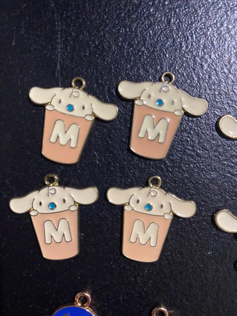 Cute Cartoon Charms (Category: Charms) located in Valenzuela. Submitted by emg.everythingmustgo (Listing ID 1415573751, Image 2). Description: 85 each design Take all 700 - Adorable cartoon charms featuring Cinnamoroll, My Melody, penguins, and other cute designs. - Ideal for DIY projects, keychains, or bag decoration. - Each charm has a loop for easy attachment. - Add a touch of cuteness to your accessories!.