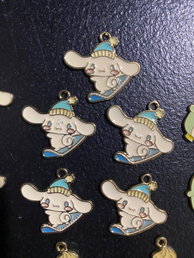 Cute Cartoon Charms (Category: Charms) located in Valenzuela. Submitted by emg.everythingmustgo (Listing ID 1415573751, Image 3). Description: 85 each design Take all 700 - Adorable cartoon charms featuring Cinnamoroll, My Melody, penguins, and other cute designs. - Ideal for DIY projects, keychains, or bag decoration. - Each charm has a loop for easy attachment. - Add a touch of cuteness to your accessories!.