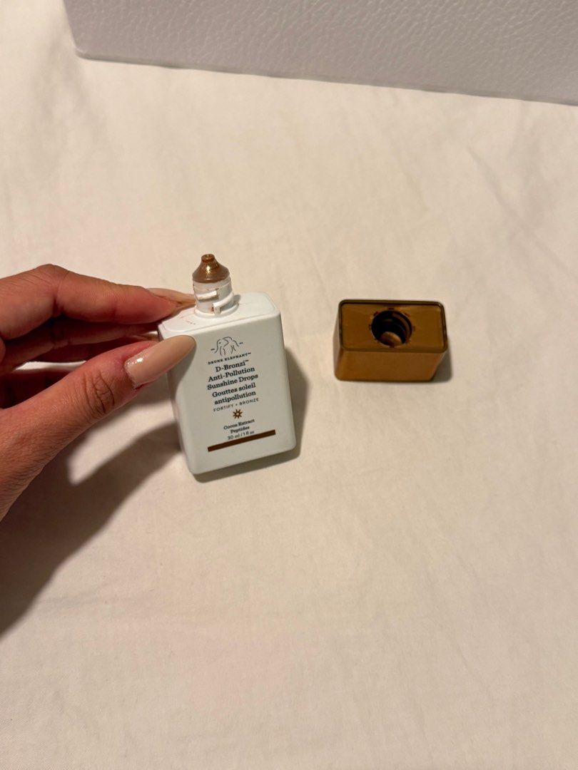 Drunk Elephant D-Bronzi 30ML (Category: Makeup) located in Manila. Submitted by kylieolarte (Listing ID 1415600536, Image 2). Description: SRP Php 2,600 selling it for Php 1.2k 80% left, almost new! Got this in thailand sephora, 100% authentic The Drunk Elephant D-Bronzi™ Anti-Pollution Sunshine Drops are a serum designed to give skin a warm, bronzy look while also providing skincare benefits.