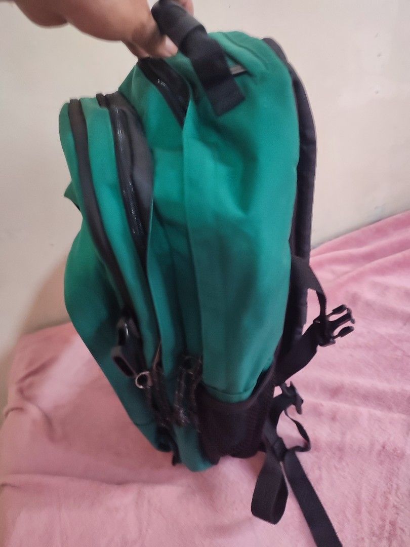 Eastpak Laptop Backpack Tutor, Tree Green (Category: Backpacks) located in Narvacan. Submitted by jigger85 (Listing ID 1415455507, Image 3). Description: - Eastpak Tutor Laptop Backpack - Color: Tree Green - Fits up to 15-inch laptops - Features: - Main compartment - Front pocket - Side pockets - Padded shoulder straps - Top handle - Black interior.