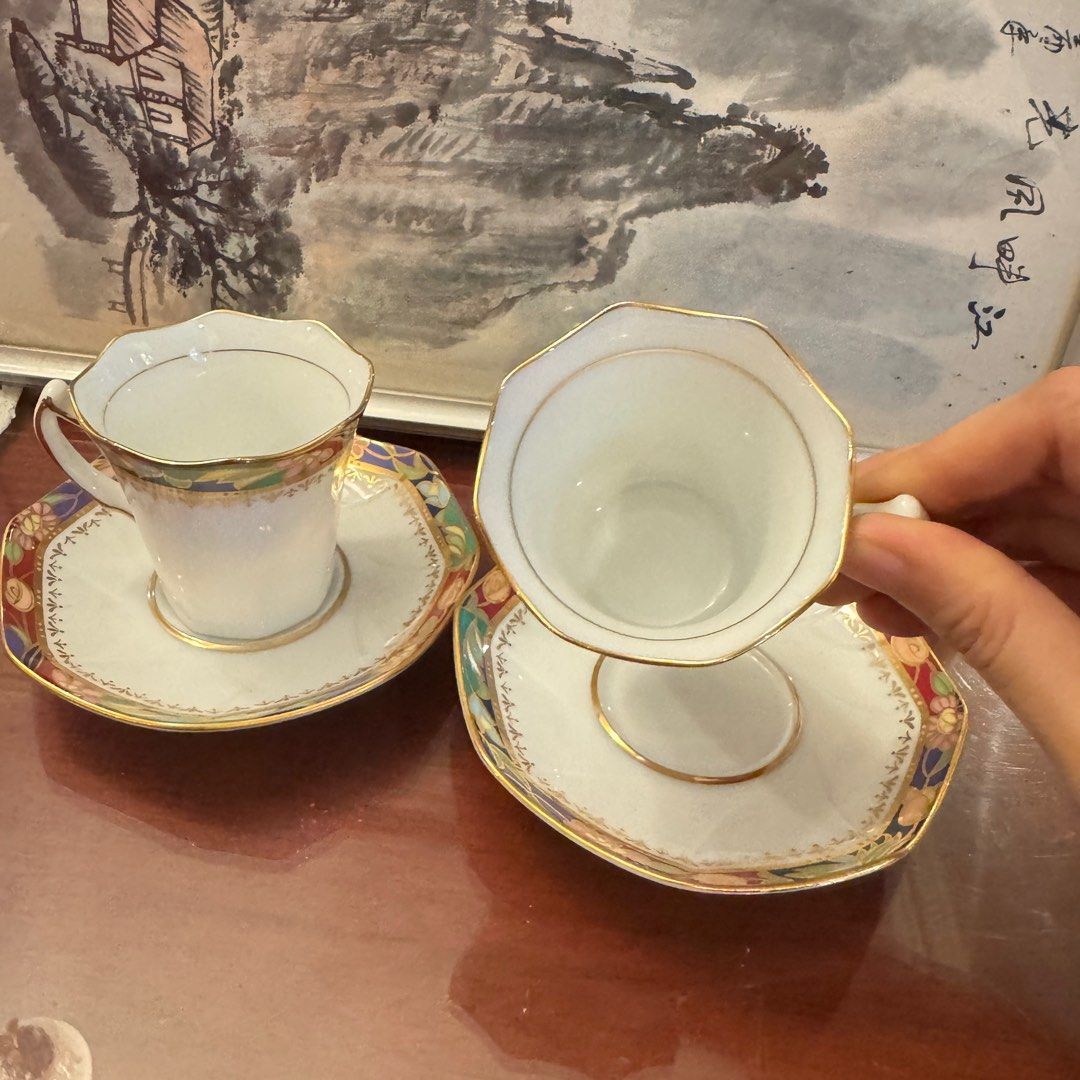 Espresso Collection Cups and Saucers 2 pairs (Category: Coffee & Tea Tableware) located in Quezon City. Submitted by kb0030 (Listing ID 1415434787, Image 3). Description: - Set includes two espresso cups and matching saucers. - Features a colorful floral and gold trim design. - Cups are white with scalloped rims. - Saucers have a unique shape. - Marked "Espresso Collection" on the bottom. - Ideal for serving espresso or small coffee drinks..