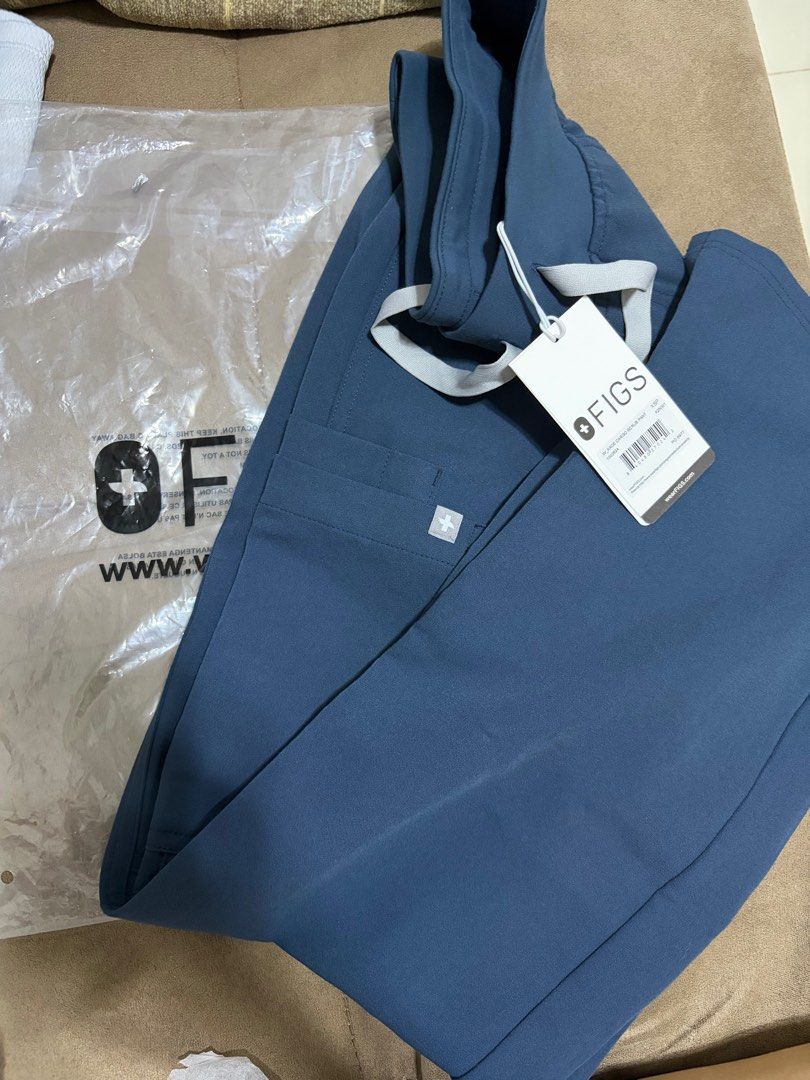 Figs Kade Cargo Scrub Pants - Dark Harbor (NO TOP) (Category: Other Bottoms) located in Quezon City. Submitted by anneiy (Listing ID 1415037959, Image 2). Description: BRAND NEW (with tag and bag) Get less than SRP MINUS the Duties (₱ 157.01) & Taxes (₱ 430), international shipping (₱ 1500) Figs Kade Cargo Scrub Pants - Color: Dark Harbor - Size: Petite XS - Features: Drawstring waist, cargo pockets - Original Price: P2,368.00 - Order Date: Janua