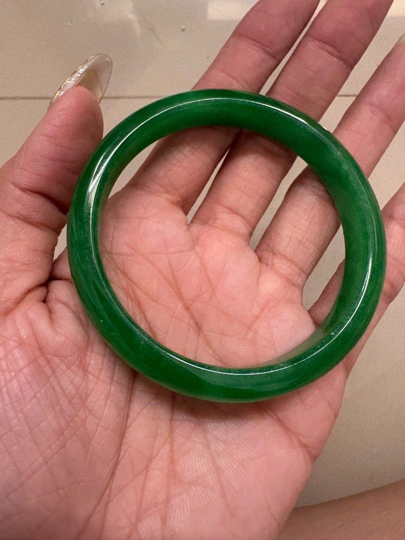 Genuine Green Myanmar Burmese Jade Bangle 52mm (Category: Bracelets) located in Makati City. Submitted by rumnougat (Listing ID 1415573020, Image 1). Description: - Vibrant green bangle - Smooth, polished surface - Comfortable fit - Classic design - Perfect for daily wear or special occasions - Adds elegance to any outfit 💯!!!!!! - for small wrists!! -.