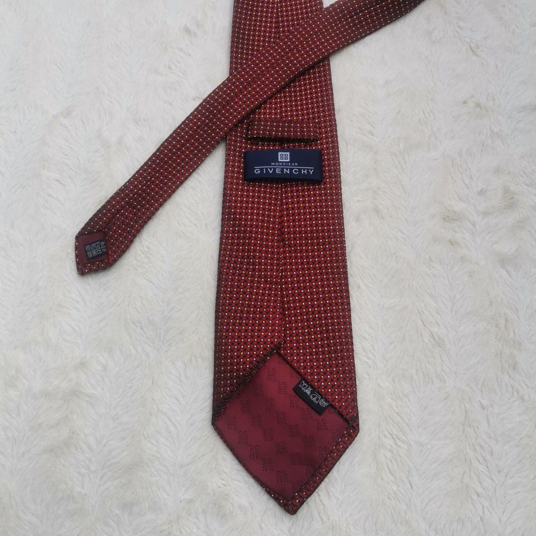 Givenchy Red Polka Dot Tie (Category: Ties) located in Manila. Submitted by titojay (Listing ID 1415455946, Image 1). Description: - Givenchy tie - Rich red color - Subtle polka dot pattern - Smooth texture - Perfect for formal or business wear.