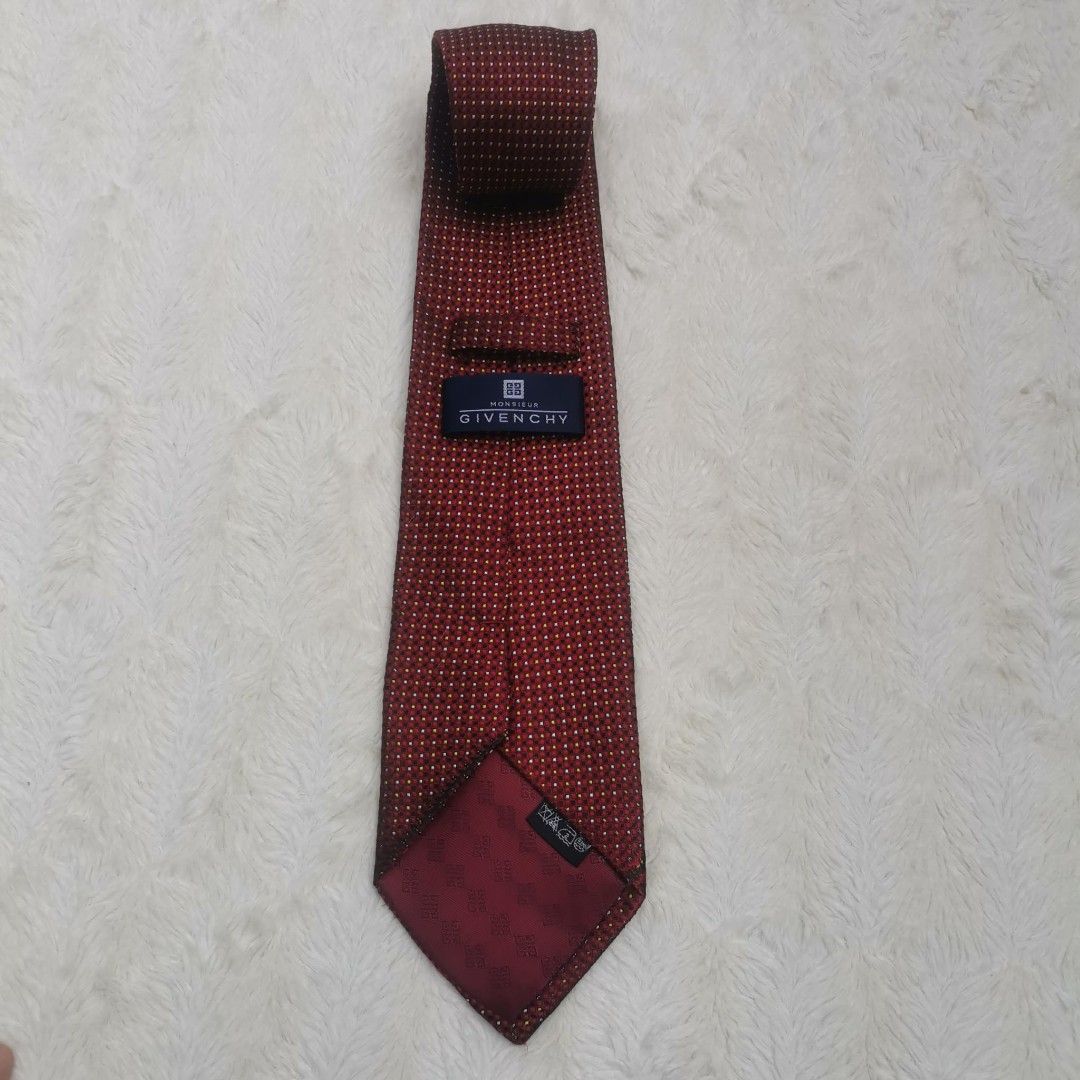 Givenchy Red Polka Dot Tie (Category: Ties) located in Manila. Submitted by titojay (Listing ID 1415455946, Image 2). Description: - Givenchy tie - Rich red color - Subtle polka dot pattern - Smooth texture - Perfect for formal or business wear.