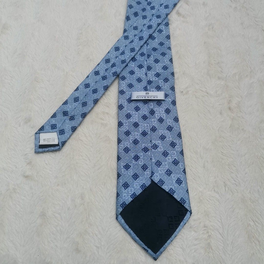 Givenchy Silk Tie (Category: Ties) located in Manila. Submitted by titojay (Listing ID 1415456416, Image 1). Description: - Givenchy tie - Light blue color - Geometric pattern - Made of silk - Classic shape - Ideal for formal occasions.