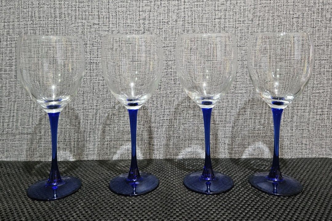 Glass Goblets Set of 4 (Category: Coffee & Tea Tableware) located in Rizal. Submitted by cherry_garcia (Listing ID 1415526234, Image 1). Description: - Set of glass goblets - Features a striking blue stem design - Suitable for wine or other beverages - Meetup available in Cainta, Rizal at Serra Monte Mansions.