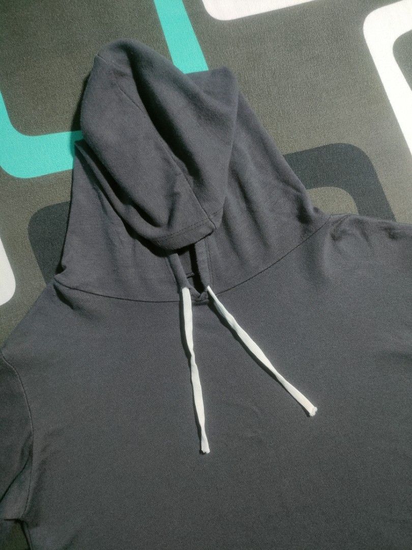 gray cropped pullover hooded sweatshirt crop hoodie (Category: Coats, Jackets and Outerwear) located in Silang. Submitted by oddsense (Listing ID 1415538931, Image 2). Description: Brand: unknown Size: fits M to L Shoulder: 44 cm Chest: 50 cm Bust: 100 cm Waist: 92 cm Length: 43 cm (excluding hoodie) Sleeve Length: 56 cm Color: Dark Gray body (may vary due to lighting) w/ White drawstring and arm accents Pattern: Solid Color Material: possibly co