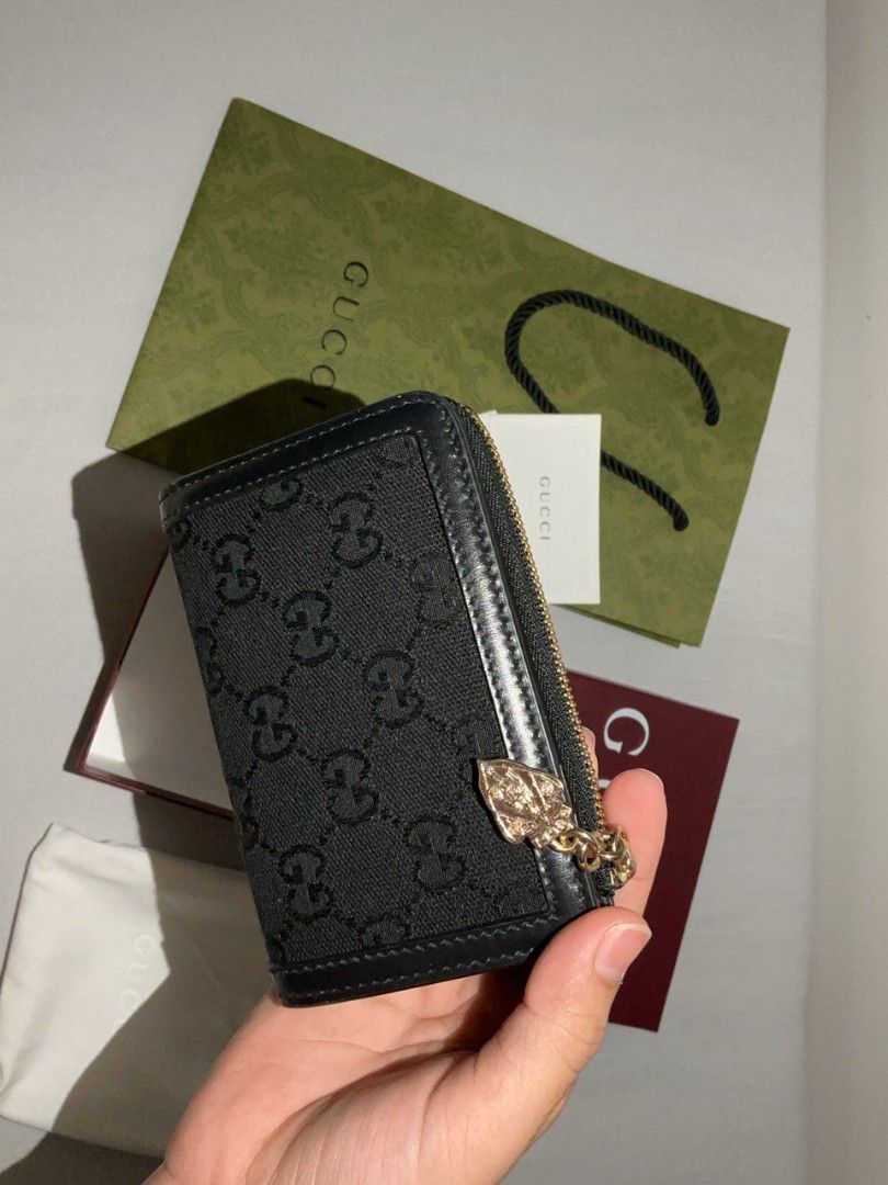 Gucci GG Marmont Zip Around Wallet (Category: Luxury Bags & Wallets) located in Mandaluyong City. Submitted by haidwii (Listing ID 1415576954, Image 3). Description: Gucci Pre-Owned 2020s GG Canvas wallet Made in Italy circa 2020s black classic GG canvas leather trim press-stud fastening internal card slots internal note compartments debossed internal logo leather lining zip-fastening compartment silver-tone hardware This piece comes complete wit