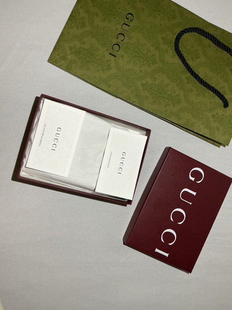 Gucci GG Marmont Zip Around Wallet (Category: Luxury Bags & Wallets) located in Mandaluyong City. Submitted by haidwii (Listing ID 1415576954, Image 2). Description: Gucci Pre-Owned 2020s GG Canvas wallet Made in Italy circa 2020s black classic GG canvas leather trim press-stud fastening internal card slots internal note compartments debossed internal logo leather lining zip-fastening compartment silver-tone hardware This piece comes complete wit