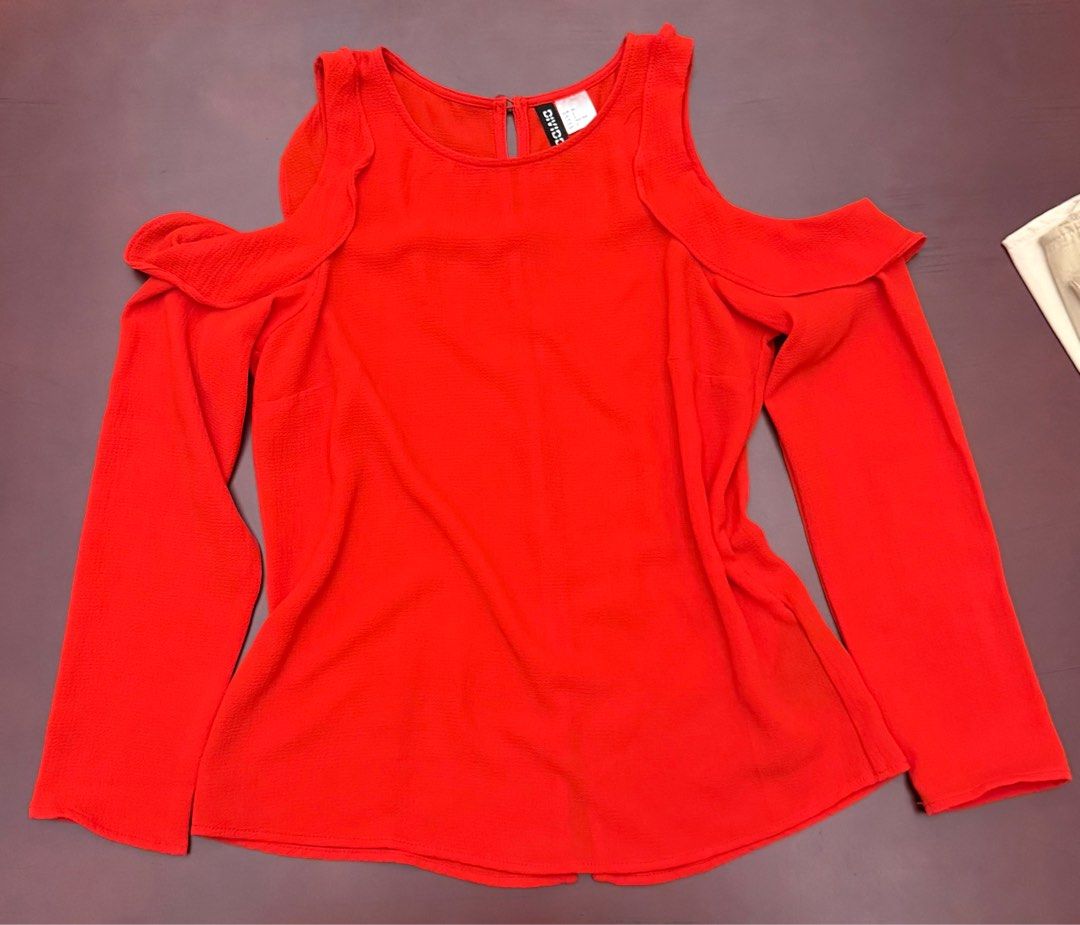 H&M red long sleeves with shoulder cut out (Category: Blouses) located in Tarlac. Submitted by elroy3 (Listing ID 1415534187, Image 1). Description: .