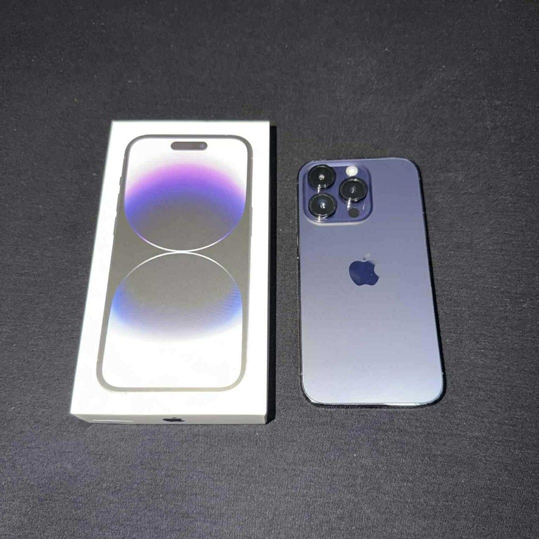 iPhone 14 Pro 128GB Deep Purple (Category: iPhone 14 Series) located in Binan City. Submitted by theomegarealm800 (Listing ID 1415444518, Image 1). Description: Device details: iPhone 14 Pro Deep Purple 128GB 73% Battery Health Wear and Tear on device: Discoloration on the corners of the stainless steel sides, especially around the charging port. The stainless steel is discolored, not scuffed or scratched. Shown on the images. Minor scratches on 