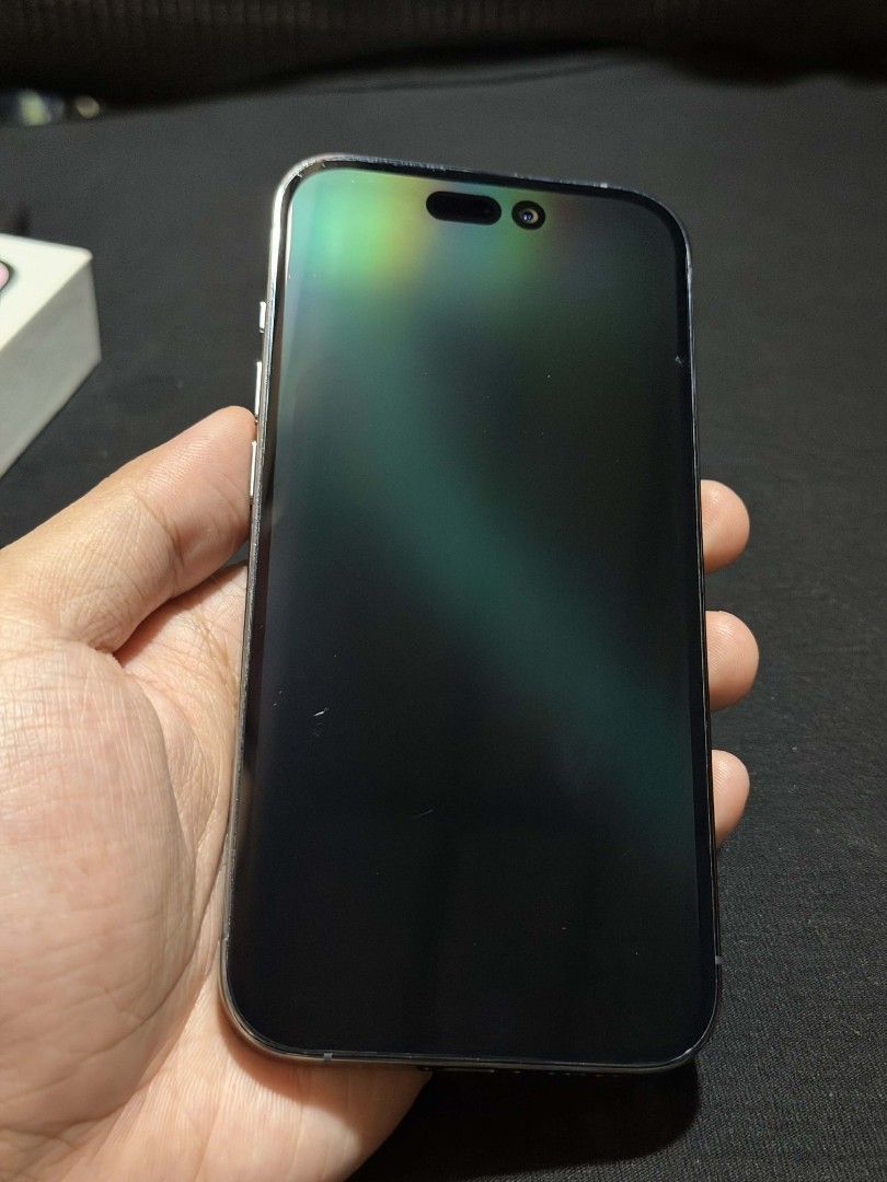 iPhone 14 Pro 128GB Deep Purple (Category: iPhone 14 Series) located in Binan City. Submitted by theomegarealm800 (Listing ID 1415444518, Image 3). Description: Device details: iPhone 14 Pro Deep Purple 128GB 73% Battery Health Wear and Tear on device: Discoloration on the corners of the stainless steel sides, especially around the charging port. The stainless steel is discolored, not scuffed or scratched. Shown on the images. Minor scratches on 