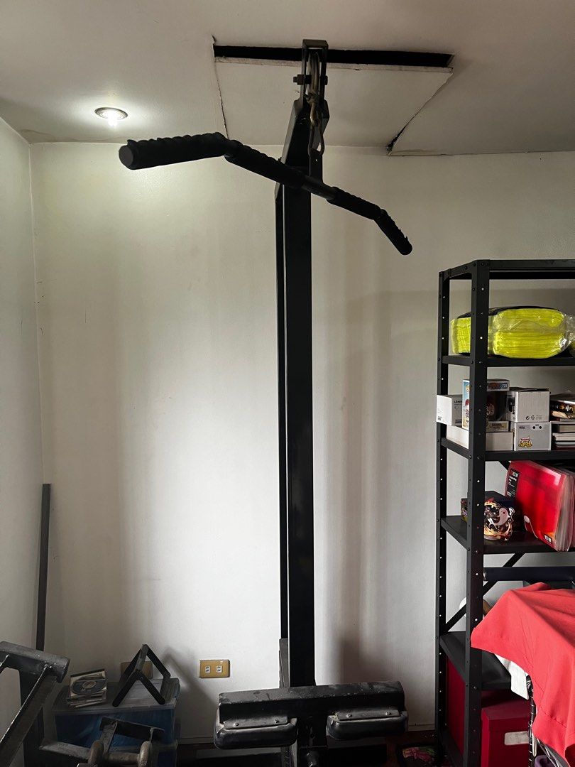 Lat Machine (Category: Weights & Dumbbells) located in Quezon City. Submitted by roejogan (Listing ID 1415484767, Image 2). Description: Lat machine includes 1 cable, close grip bar, wide grip bar, vbar, and rowing foot rest. Rfs decluttering.