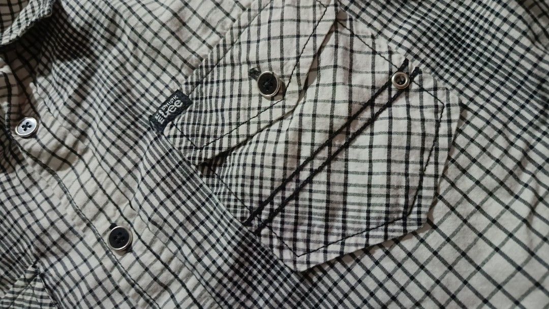 Lee Semi Fit Checkered Shirt (Category: Tshirts & Polo Shirts ) located in General Trias. Submitted by ecsandt (Listing ID 1415491136, Image 2). Description: + Lee checkered polo + Black and white color + Semi-fit style + Button-down front - Two chest pockets - Long sleeves - Features the Lee logo.