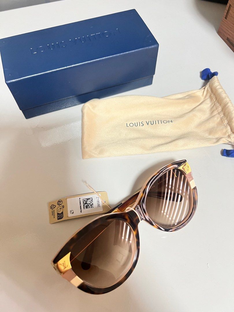 Louis Vuitton Cat Eye Sunglasses (Category: Sunglasses & Eyewear) located in Rizal. Submitted by ichaaay21 (Listing ID 1415537862, Image 2). Description: - Authentic Louis Vuitton sunglasses - Cat-eye frame with tortoise shell pattern - Includes original box, dust bag, and tags - Gold-toned arms with Louis Vuitton logo - Made in Italy - Model number: Z1858E *slightly neg.