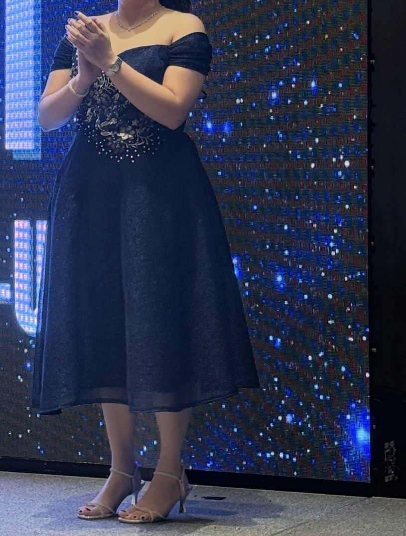 Navy Blue Off-Shoulder Dress (Category: Dresses) located in Quezon City. Submitted by decluttering.mommah (Listing ID 1415613239, Image 2). Description: Navy blue off-shoulder dress with floral bodice detail. Mid-calf length, perfect for formal events. Flattering silhouette. Fits up to 32 waistline.