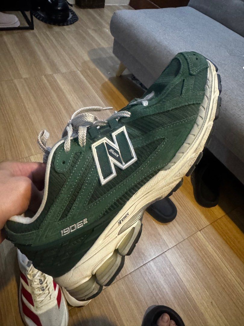 New Balance 1906R olive green (Category: Sneakers) located in Cavite. Submitted by daddy_ag (Listing ID 1415505355, Image 1). Description: Pair only Some signs of usage Not used for running.