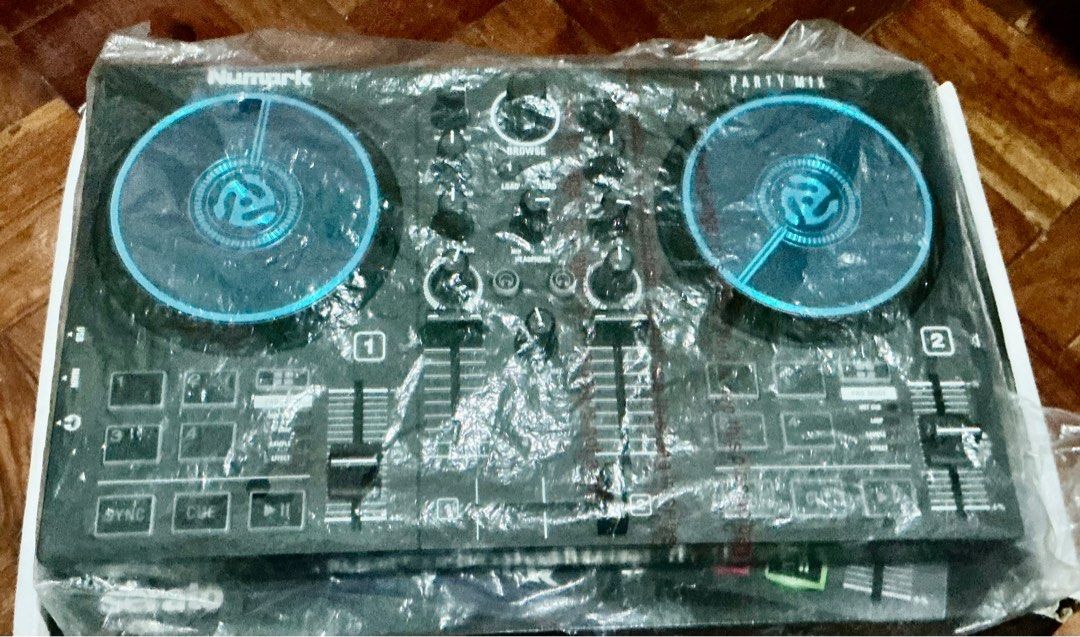 Numark Party Mix 2 DJ Controller (Category: Other Audio Equipment) located in Quezon City. Submitted by marydominique29 (Listing ID 1415599185, Image 3). Description: - Numark Party Mix DJ controller - Built-in light show - Includes Serato DJ software - Two decks - Browse controls and effects - Comes with USB cable - Original packaging included.