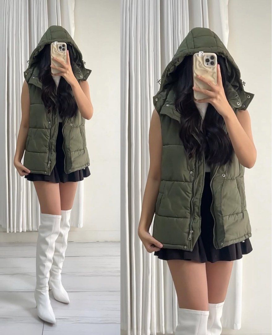 Olive Green Puffer Vest with Hood (Category: Coats, Jackets and Outerwear) located in Makati City. Submitted by astrastella (Listing ID 1415566539, Image 1). Description: - Olive green puffer vest - Hooded - Zip closure - Sleeveless - Quilted design Never used. Bought on IG..