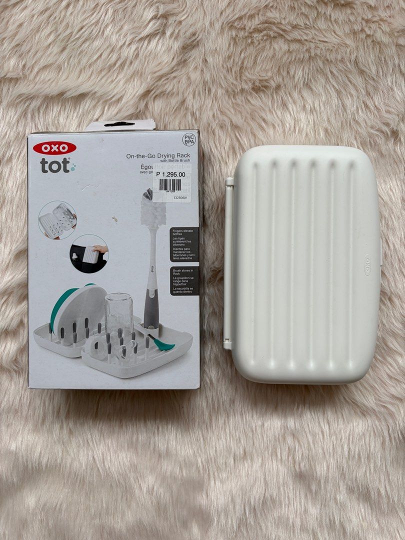 OXO Tot On-the-Go Drying Rack (Category: Breastfeeding & Bottle Feeding) located in Cebu City. Submitted by happyheartcebu (Listing ID 1415451393, Image 3). Description: - OXO Tot On-the-Go Drying Rack - Ideal for baby bottles and accessories - Includes a bottle brush - Compact and portable design - Features pegs for bottles and a water-catching tray - Original price: ₱1,295.00 - Convenient for parents on the go.