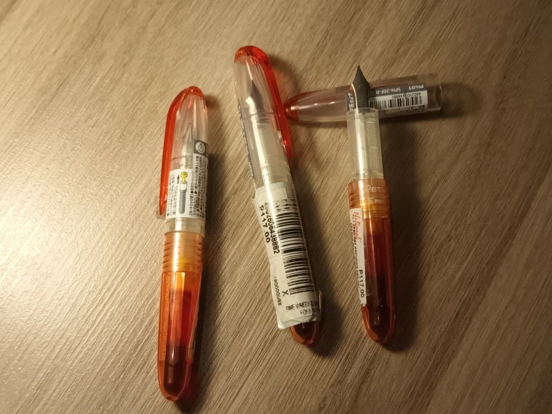 Pilot Petit1 Fountain Pen (Category: Stationery & School Supplies) located in Makati City. Submitted by m_brian (Listing ID 1415621255, Image 3). Description: - Pilot petit1 fountain pens - Fine nib - Clear bodies: red(looks orange), baby pink, and black - With 1 cartridge - Selling per piece - New and unused -⚠️ With sticky NBS sticker - 4 blacks - 3 reds - 3 baby pink .