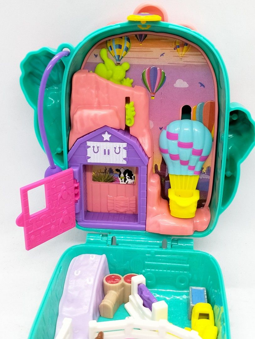 Poly Pocket Cactus Suitcase Playset (Category: Kids Toys) located in Baguio. Submitted by toys_of_yesteryear (Listing ID 1415607136, Image 2). Description: 📌location: Baguio Imported surplus item. USED in very good condition, No flaws 👉Polly Pocket 👉Cactus suitcase playset. Cactus suitcase + 3 mini figures 👉4*2*5 inches LWH 👉note: crossposted Courier: J&T Payment: G-cash note: Asap as soon as payment is received but shipping might take longe